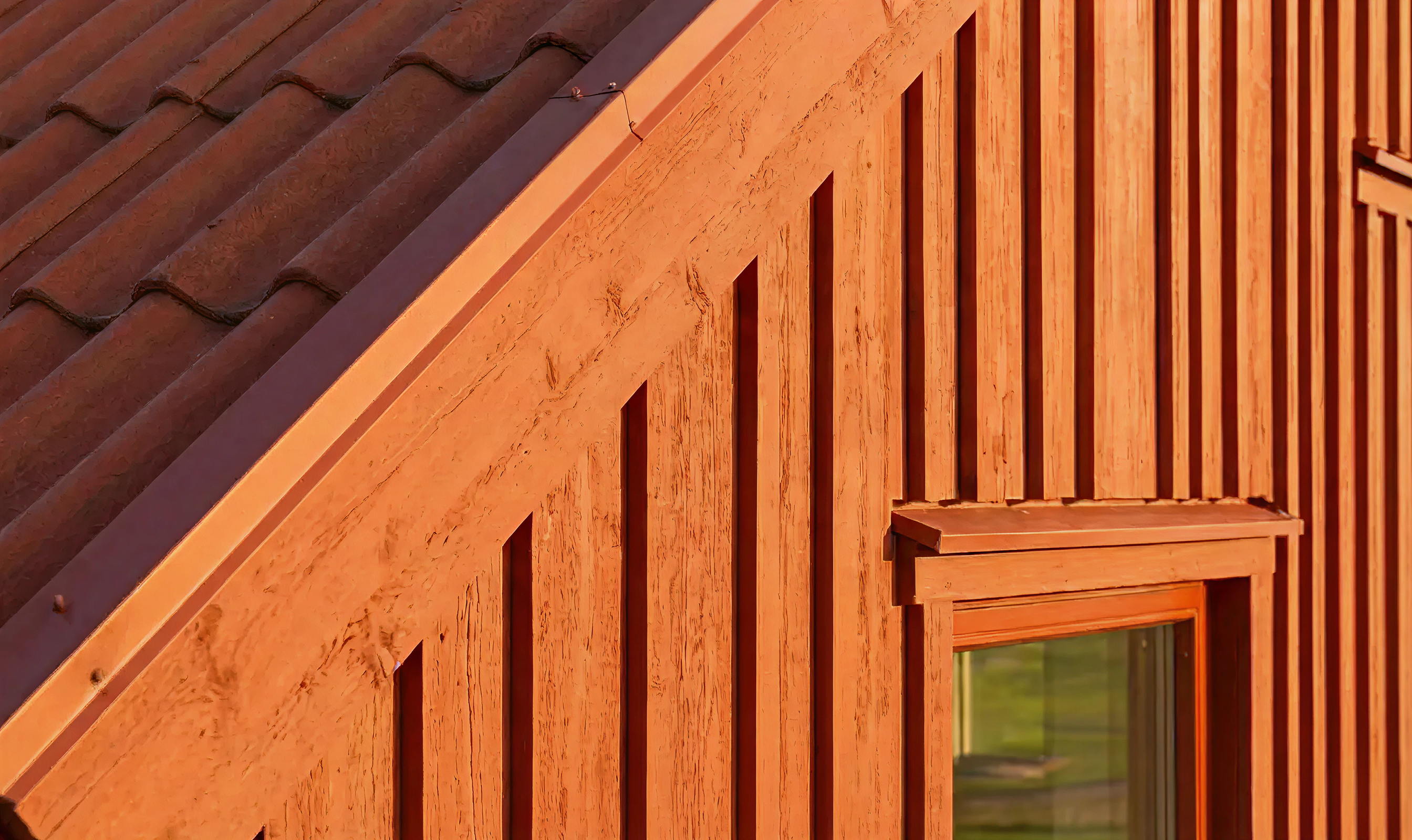 Renderad närbild av bostadens tak och fasad.