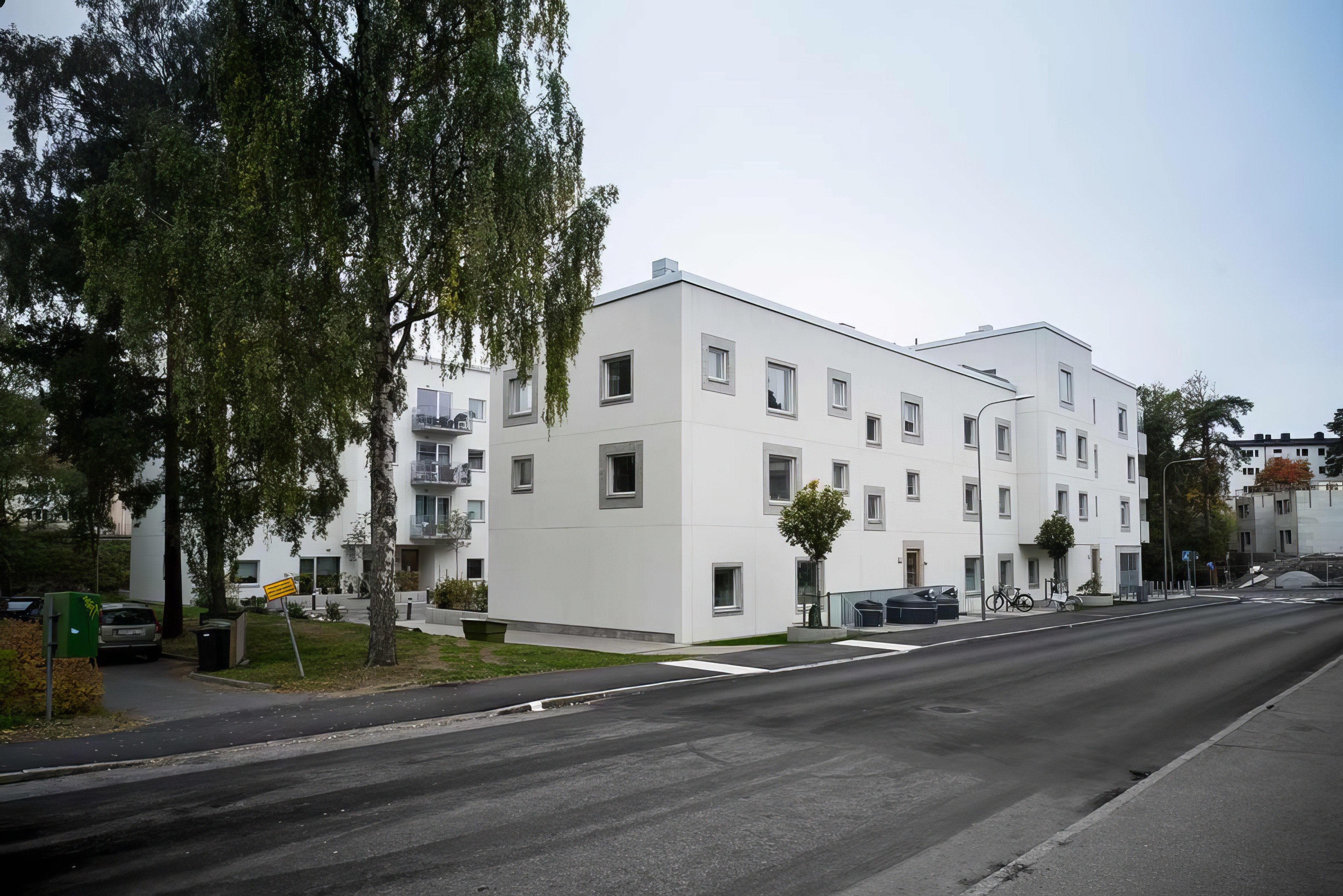 Renderad närbild av bostadens tak och fasad.